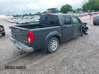 2015 Nissan Frontier SL with VIN 1N6AD0EV1FN764719, listed as a IAAI auction lot 42512771 with 104,572 mi miles and . Bid and sale history available at DreamBid. Image 4.