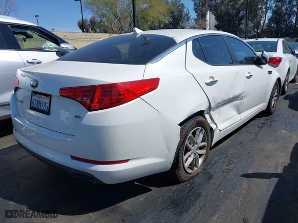 2013 Kia Optima LX with VIN KNAGM4A71D5383314, listed as a IAAI auction lot 41812942 with 228,220 mi miles. Bid and sale history available at carsss.com. Image 4.