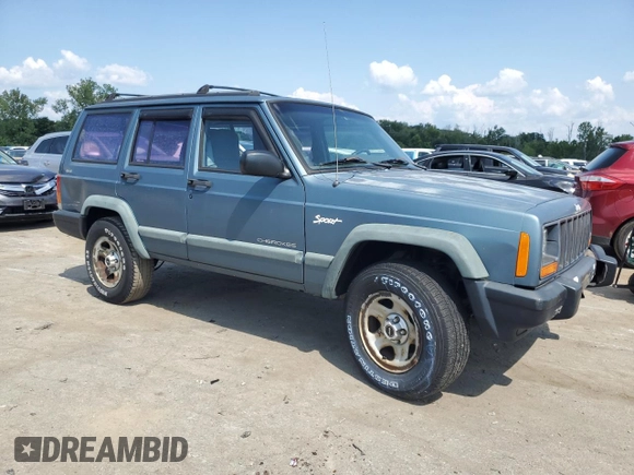 1997 Jeep Cherokee Sport with VIN 1J4FJ68S4VL607745, listed as a Copart auction lot 67521394 with 143,814 mi miles and Clean Title. Bid and sale history available at carsss.com. Image 4.