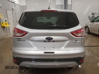2014 Ford Escape SE with VIN 1FMCU0GX7EUD32727, listed as a Copart auction lot 44636225 with 133,296 mi miles and Salvage Title. Bid and sale history available at carsss.com. Image 6.