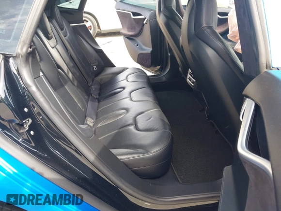 2013 Tesla Model S Performance with VIN 5YJSA1DP5DFP25345, listed as a IAAI auction lot 42288379 with 165,915 mi miles and . Bid and sale history available at DreamBid. Image 8.