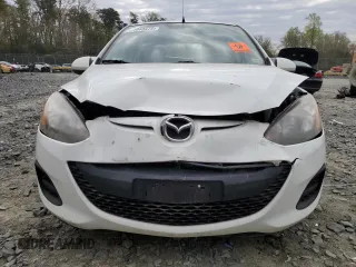 2014 Mazda 2 Sport with VIN JM1DE1KY3E0181629, listed as a Copart auction lot 51043475 with 107,849 mi miles and Salvage Title. Bid and sale history available at carsss.com. Image 5.