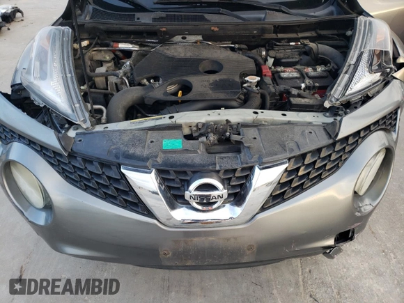 2015 Nissan Juke SL z VIN JN8AF5MR0FT502205, wystawiony jako Copart lot #80683154 z przebiegiem 131 876 mil mil oraz Szkoda całkowita • Salvage title. Historia ofert i sprzedaży dostępna na DreamBid. Obrazek 11.