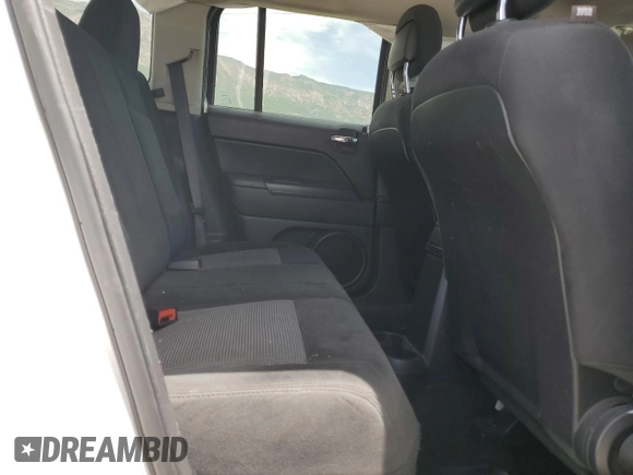 2016 Jeep Patriot Sport with VIN 1C4NJPBAXGD648790, listed as a Copart auction lot 59492765 with 96,346 mi miles and Salvage title. Bid and sale history available at DreamBid. Image 11.