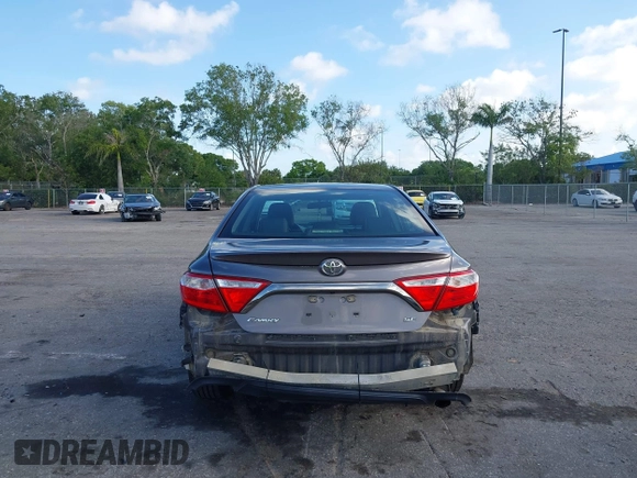 2015 Toyota Camry XLE with VIN 4T1BF1FK6FU046922, listed as a IAAI auction lot 41967284 with 82,487 mi miles and . Bid and sale history available at DreamBid. Image 16.