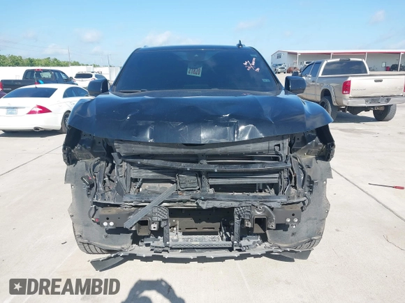 2023 Chevrolet Tahoe LT z VIN 1GNSCNKDXPR477061, wystawiony jako IAAI lot #42225743 z przebiegiem 57 077 mil mil oraz . Historia ofert i sprzedaży dostępna na DreamBid. Obrazek 12.