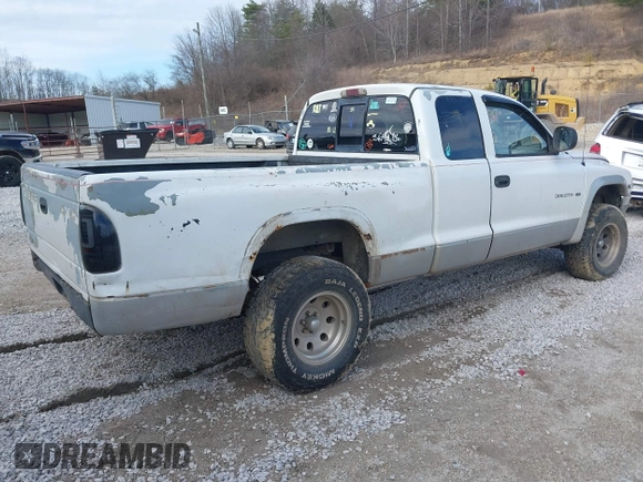 1997 Dodge Dakota with VIN 1B7GG23X0VS136400, listed as a IAAI auction lot 41642514 with 223,696 mi miles. Bid and sale history available at carsss.com. Image 4.