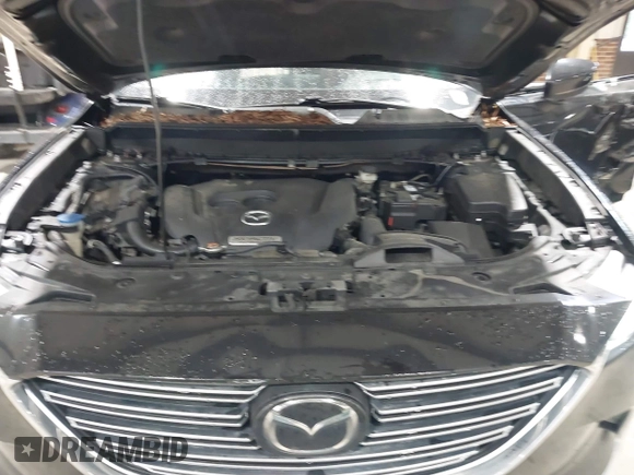 2016 Mazda CX-9 Signature z VIN JM3TCBEY5G0111286, wystawiony jako IAAI lot #42018161 z przebiegiem 155 920 mil mil oraz . Historia ofert i sprzedaży dostępna na DreamBid. Obrazek 10.