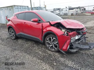 2021 Toyota C-HR LE with VIN JTNKHMBX1M1104530, listed as a IAAI auction lot 41324350 with 53,112 mi miles. Bid and sale history available at carsss.com. Image 1.