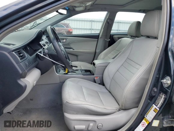 2015 Toyota Camry LE with VIN 4T1BD1FK0FU157472, listed as a Copart auction lot 58009875 with 81,764 mi miles and Salvage title. Bid and sale history available at DreamBid. Image 7.