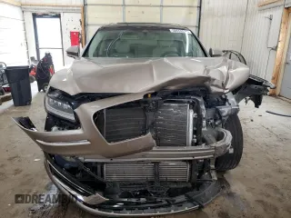 2020 Lincoln Nautilus Reserve z VIN 2LMPJ8K93LBL02777, wystawiony jako Copart lot #59559575 z przebiegiem Nie podano mil oraz Szkoda całkowita • Salvage title. Historia ofert i sprzedaży dostępna na DreamBid. Obrazek 5.