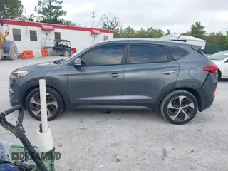 2016 Hyundai Tucson Limited with VIN KM8J33A27GU245096, listed as a IAAI auction lot 41961905 with 101,195 mi miles. Bid and sale history available at carsss.com. Image 14.
