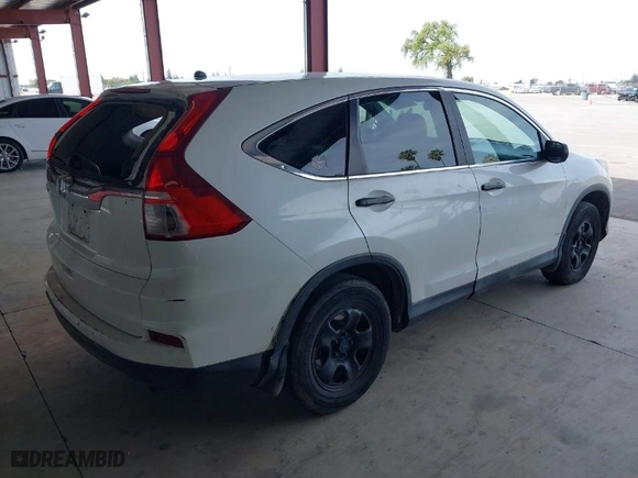 2015 Honda CR-V LX with VIN 5J6RM3H39FL002925, listed as a IAAI auction lot 41854888 with 94,530 mi miles. Bid and sale history available at carsss.com. Image 4.