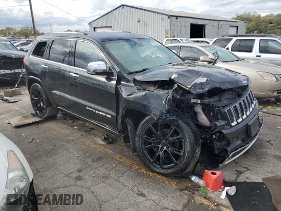 2014 Jeep Grand Cherokee Overland with VIN 1C4RJECG1EC556155, listed as a Copart auction lot 75641034 with 116,549 mi miles and Salvage Title. Bid and sale history available at carsss.com. Image 4.