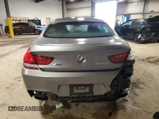 2013 BMW 6 Series 650i xDrive z VIN WBA6B4C56DD098658, wystawiony jako Copart lot #55408535 z przebiegiem 72 964 mil mil oraz Szkoda całkowita • Salvage title. Historia ofert i sprzedaży dostępna na DreamBid. Obrazek 6.