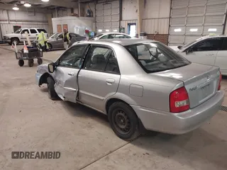 2000 Mazda Protege DX with VIN JM1BJ2226Y0206340, listed as a IAAI auction lot 41645396 with 238,500 mi miles and . Bid and sale history available at DreamBid. Image 3.