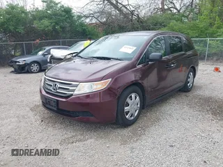 2013 Honda Odyssey LX with VIN 5FNRL5H25DB080209, listed as a IAAI auction lot 42123644 with 157,631 mi miles and . Bid and sale history available at carsss.com. Image 21.