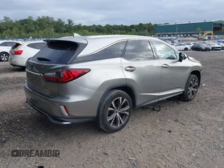 2018 Lexus RX 350L Premium z VIN JTJDZKCA2J2005016, wystawiony jako IAAI lot #40415146 z przebiegiem 33 212 mil mil oraz . Historia ofert i sprzedaży dostępna na DreamBid. Obrazek 4.