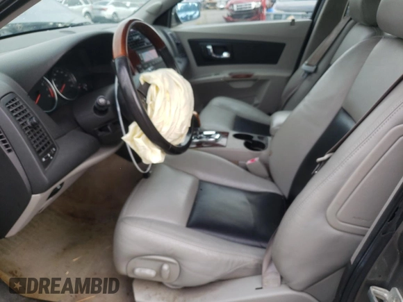 2006 Cadillac CTS with VIN 1G6DP577960116712, listed as a Copart auction lot 73001114 with 103,793 mi miles and Salvage Title. Bid and sale history available at carsss.com. Image 7.