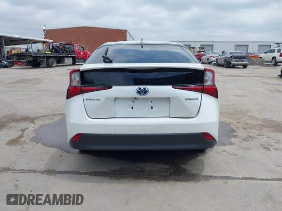 2022 Toyota Prius L Eco with VIN JTDKAMFUXN3157225, listed as a IAAI auction lot 39292379 with 59,333 mi miles and . Bid and sale history available at DreamBid. Image 17.