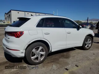2020 Audi Q3 Premium with VIN WA1AECF30L1023652, listed as a Copart auction lot 57148915 with 69,621 mi miles and Salvage title. Bid and sale history available at DreamBid. Image 3.