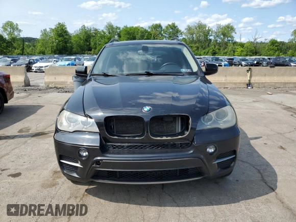 2012 BMW X5 35i with VIN 5UXZV4C59CL752661, listed as a Copart auction lot 58590305 with 101,725 mi miles and Salvage title. Bid and sale history available at DreamBid. Image 5.