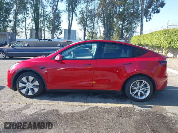 2020 Tesla Model Y Long Range with VIN 5YJYGDEE8LF057014, listed as a IAAI auction lot 41988113 with 18,246 mi miles and . Bid and sale history available at DreamBid. Image 15.