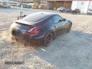 2019 Nissan 370Z Sport Touring with VIN JN1AZ4EH0KM420226, listed as a IAAI auction lot 41769891 with 18,453 mi miles and . Bid and sale history available at DreamBid. Image 4.