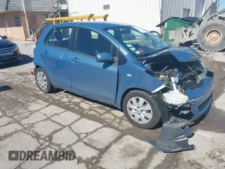 2009 Toyota Yaris with VIN JTDKT903895239617, listed as a IAAI auction lot 41743613 with 93,443 mi miles. Bid and sale history available at carsss.com. Image 1.
