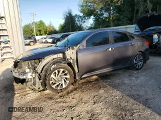 2017 Honda Civic EX z VIN 19XFC2F71HE017068, wystawiony jako Copart lot #53541655 z przebiegiem 148 087 mil mil oraz Szkoda całkowita • Salvage title. Historia ofert i sprzedaży dostępna na DreamBid. Obrazek 1.