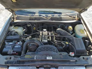 1998 Jeep Grand Cherokee Laredo with VIN 1J4GZ58S5WC165213, listed as a Copart auction lot 77611434 with 168,688 mi miles and Salvage Title. Bid and sale history available at carsss.com. Image 12.