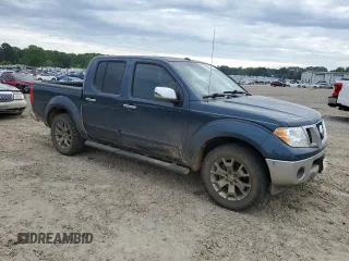 2015 Nissan Frontier SL with VIN 1N6AD0EV9FN724405, listed as a Copart auction lot 54301445 with 164,549 mi miles and Clean title. Bid and sale history available at DreamBid. Image 4.