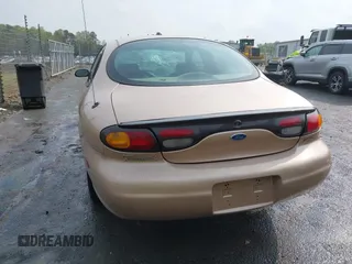 1997 Ford Taurus GL z VIN 1FALP52U2VA273762, wystawiony jako IAAI lot #41956536 z przebiegiem 177 340 mil mil oraz . Historia ofert i sprzedaży dostępna na DreamBid. Obrazek 16.