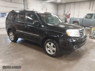 2012 Honda Pilot Touring with VIN 5FNYF4H91CB067014, listed as a IAAI auction lot 41749402 with 151,248 mi miles. Bid and sale history available at carsss.com. Image 1.