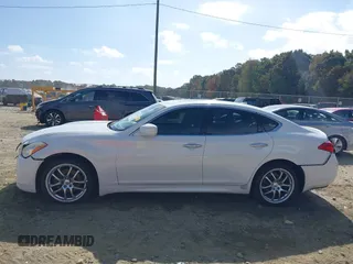 2012 Infiniti M37 with VIN JN1BY1AP6CM333466, listed as a IAAI auction lot 40723440 with 156,102 mi miles. Bid and sale history available at carsss.com. Image 14.