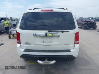 2014 Honda Pilot EX-L with VIN 5FNYF4H52EB055549, listed as a IAAI auction lot 42086456 with 292,594 mi miles and . Bid and sale history available at carsss.com. Image 17.