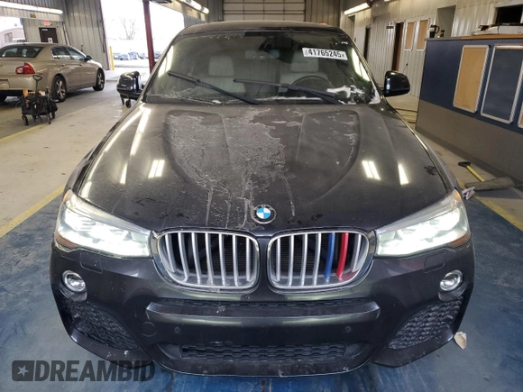 2015 BMW X4 xDrive35i with VIN 5UXXW5C51F0E88340, listed as a Copart auction lot 41765245 with 140,510 mi miles and Clean title. Bid and sale history available at DreamBid. Image 5.