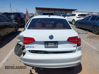 2015 Volkswagen Jetta SE z VIN 3VWD07AJ5FM346565, wystawiony jako IAAI lot #42104880 z przebiegiem 93 491 mil mil oraz . Historia ofert i sprzedaży dostępna na DreamBid. Obrazek 16.