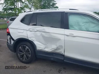 2018 Volkswagen Tiguan SEL with VIN 3VV2B7AX4JM012840, listed as a IAAI auction lot 42263511 with 105,510 mi miles and . Bid and sale history available at DreamBid. Image 6.