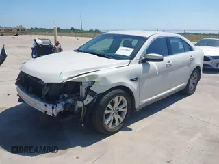 2011 Ford Taurus SEL z VIN 1FAHP2HW7BG148004, wystawiony jako IAAI lot #42245047 z przebiegiem 102 999 mil mil oraz . Historia ofert i sprzedaży dostępna na DreamBid. Obrazek 2.
