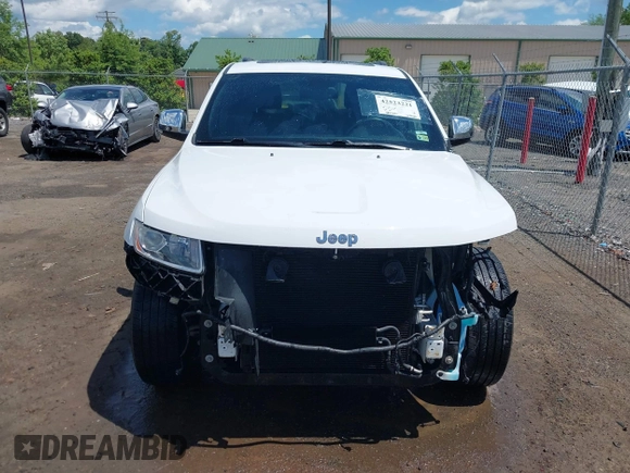 2014 Jeep Grand Cherokee Limited with VIN 1C4RJFBG3EC350648, listed as a IAAI auction lot 42523221 with 125,447 mi miles and . Bid and sale history available at DreamBid. Image 13.