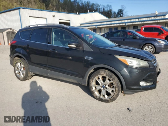 2014 Ford Escape Titanium with VIN 1FMCU9J94EUE57909, listed as a Copart auction lot 51955785 with 154,819 mi miles and Salvage Title. Bid and sale history available at DreamBid. Image 4.