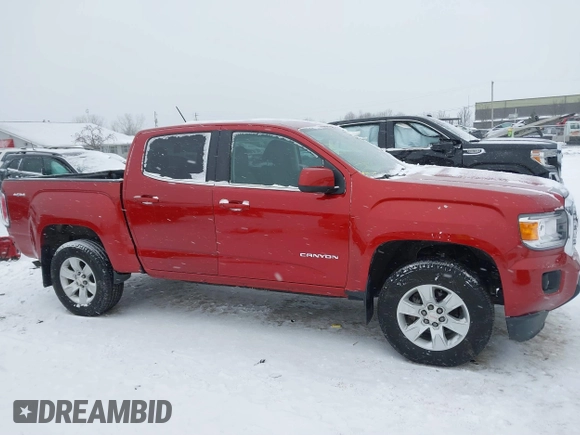 2016 GMC Canyon 4WD SLE with VIN 1GTG6CE32G1135910, listed as a IAAI auction lot 41322744 with 132,586 mi miles. Bid and sale history available at carsss.com. Image 14.