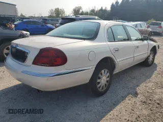2001 Lincoln Continental with VIN 1LNHM97V91Y659769, listed as a Copart auction lot 71220804 with 0 mi miles and Salvage Title. Bid and sale history available at carsss.com. Image 3.