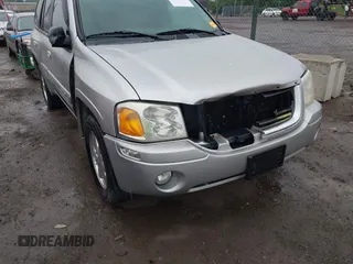2004 GMC Envoy SLT z VIN 1GKDT13S742130352, wystawiony jako IAAI lot #42355072 z przebiegiem 170 355 mil mil oraz . Historia ofert i sprzedaży dostępna na DreamBid. Obrazek 6.