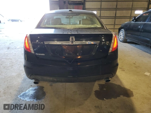 2012 Lincoln MKS with VIN 1LNHL9DR1CG806704, listed as a Copart auction lot 87666765 with 111,933 mi miles and Salvage Title. Bid and sale history available at carsss.com. Image 6.