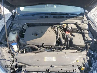 2015 Ford Fusion SE z VIN 1FA6P0HD3F5122477, wystawiony jako Copart lot #65189115 z przebiegiem 169 840 mil mil oraz Czysty tytuł • Clean title. Historia ofert i sprzedaży dostępna na DreamBid. Obrazek 11.