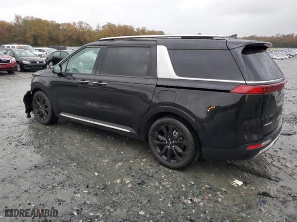 2023 Kia Carnival SX Prestige with VIN KNDNE5H32P6266999, listed as a Copart auction lot 84406004 with 35,082 mi miles and Salvage Title. Bid and sale history available at carsss.com. Image 2.