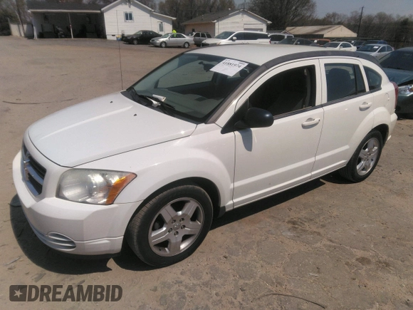 2009 Dodge Caliber SXT with VIN 1B3HB48A19D259105, listed as a IAAI auction lot 41881974 with 127,096 mi miles and . Bid and sale history available at DreamBid. Image 2.