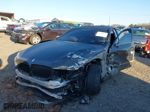 2019 BMW 5 Series M550i xDrive with VIN WBAJB9C50KB464159, listed as a IAAI auction lot 41758879 with 9,000 mi miles and . Bid and sale history available at DreamBid. Image 23.